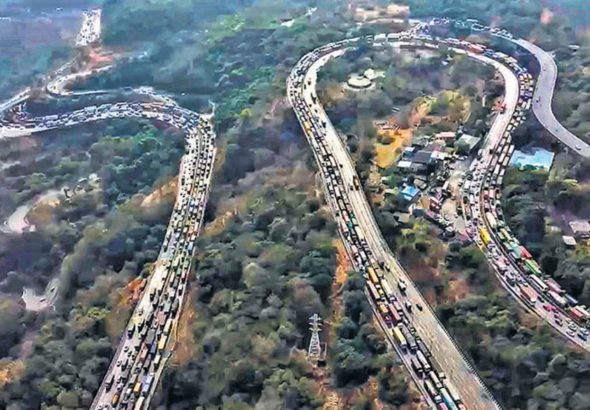 Vehicles-stuck-in-a-traffic-jam-on-the-Mumbai-Pune_1770232861024