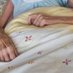 old-woman-bed-skinny-arms-hands-very-lying-40699566