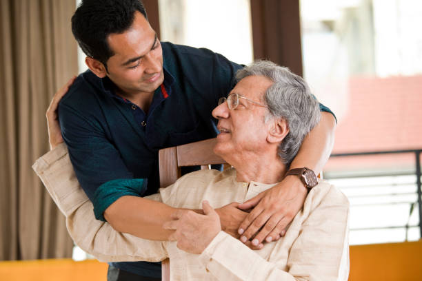 Man spending time with his father at home